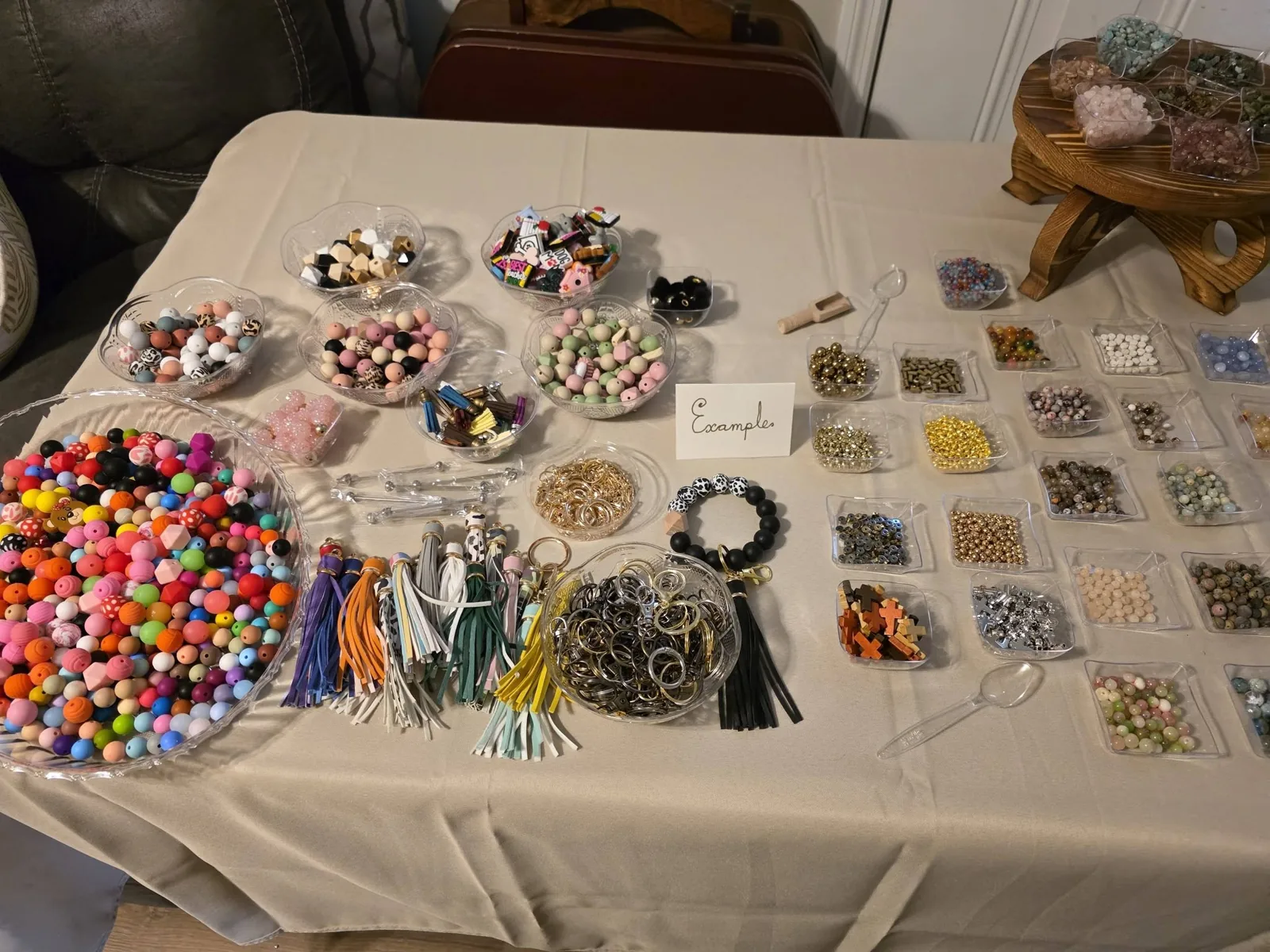Bowls of beads, charms and letters ready for guests